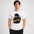 Young man wearing a premium white custom-printed Jr. NTR t-shirt featuring a stylized artistic portrait of the actor with bold brush strokes and the text "NTR Man of Masses God of Acting" from CustomPe.
